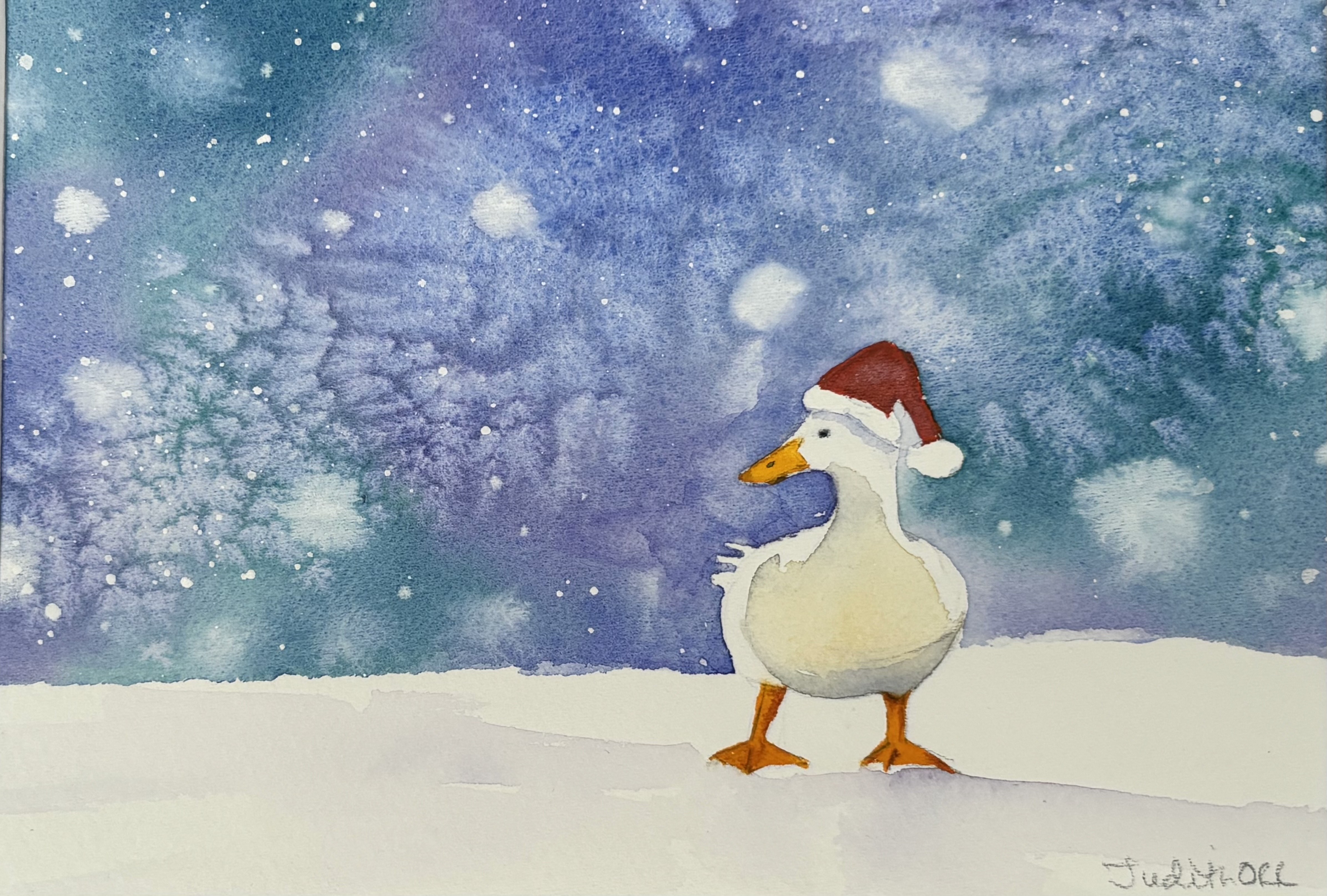 A duck wearing a santa hat, alongside a snowy winter scene.